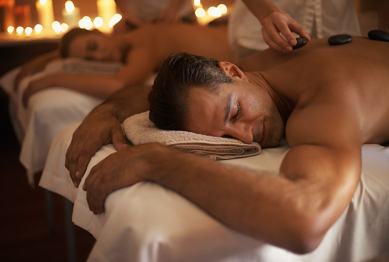 Two guests getting a couples massage at Ocean Spa
