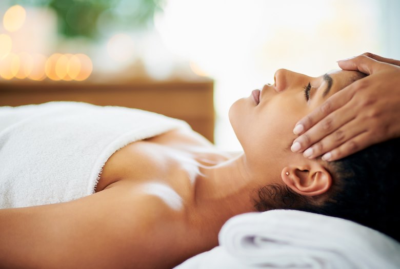 Guest relaxing on a massage table at Ocean Spa in the Florida Keys