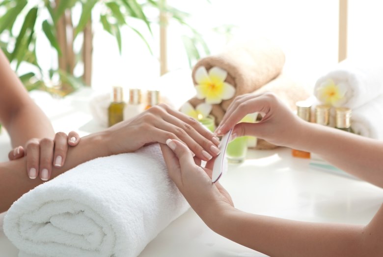 Guest nails being prepared for relaxing manicure treatment at Playa Largo Resort's Ocean Spa in Key Largo